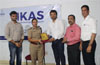 Vikas College donates 8 road barricades to the traffic police department
